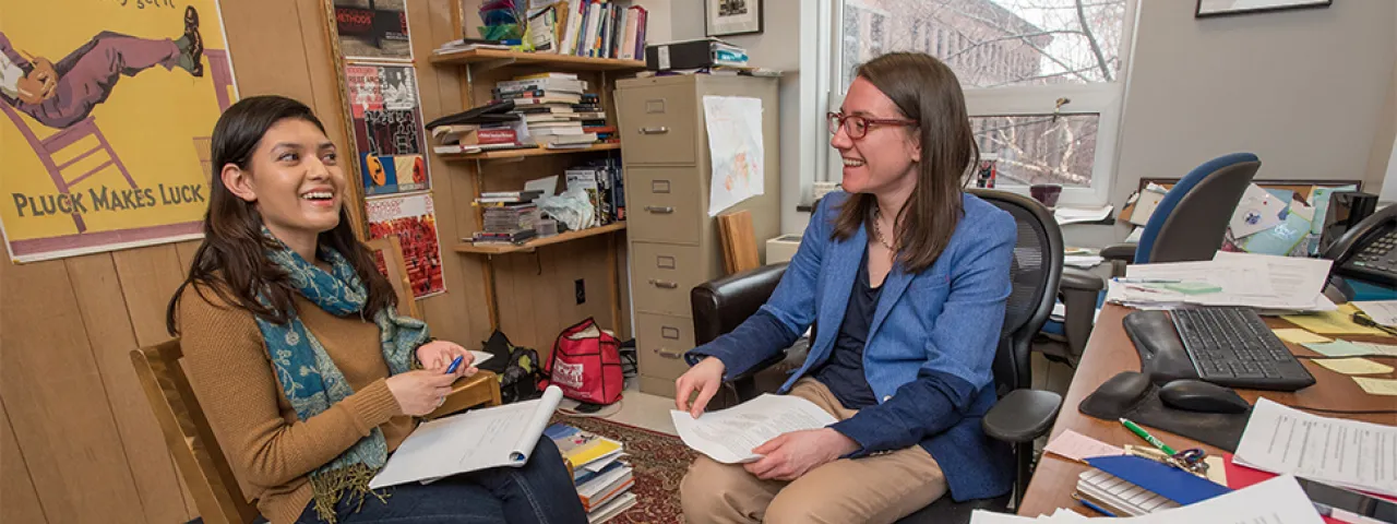 Tina Wildhagen meeting with a student in her office