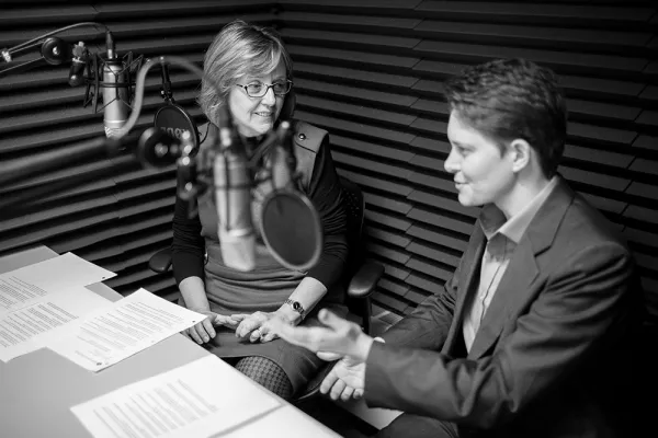Kathleen McCartney and Dorie Clark in an audio studio