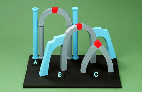 Model with three arch-shaped structures labeled A, B, and C on a black base. Each arch has blue pillars and gray stone with red accents.