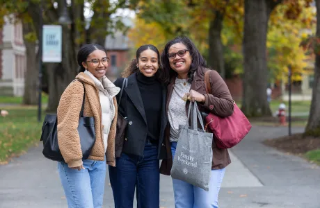 A family poses during Family Weekend.