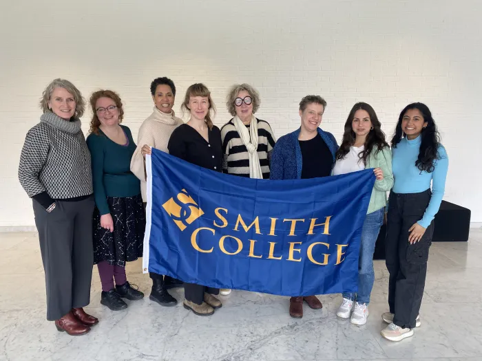 Smithies in Aalborg, Denmark, holding the Smith banner at the Kunsten Museum of Modern Art