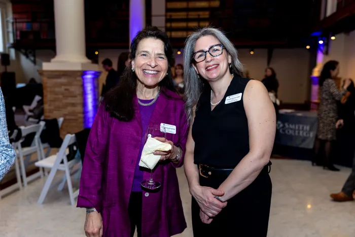 Beth Raffeld and Amanda Rivera López smile at the camera