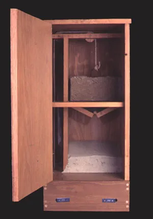 Open wooden cabinet featuring two compartments