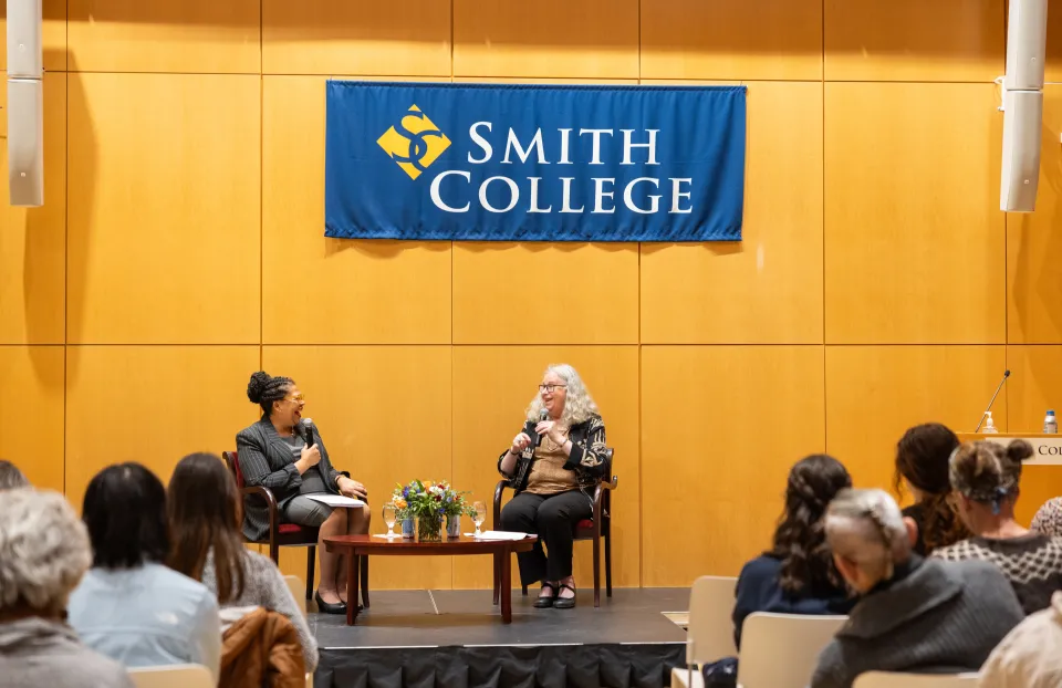 Sarah Willie-LeBreton talks to Admiral Rachel Levine onstage during a Smith College colloquium.