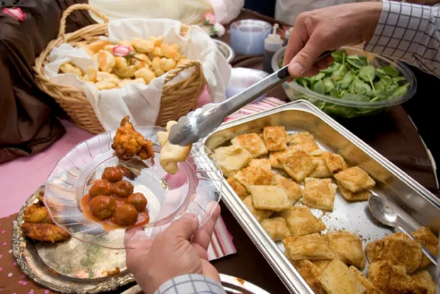 Making selections from a buffet table